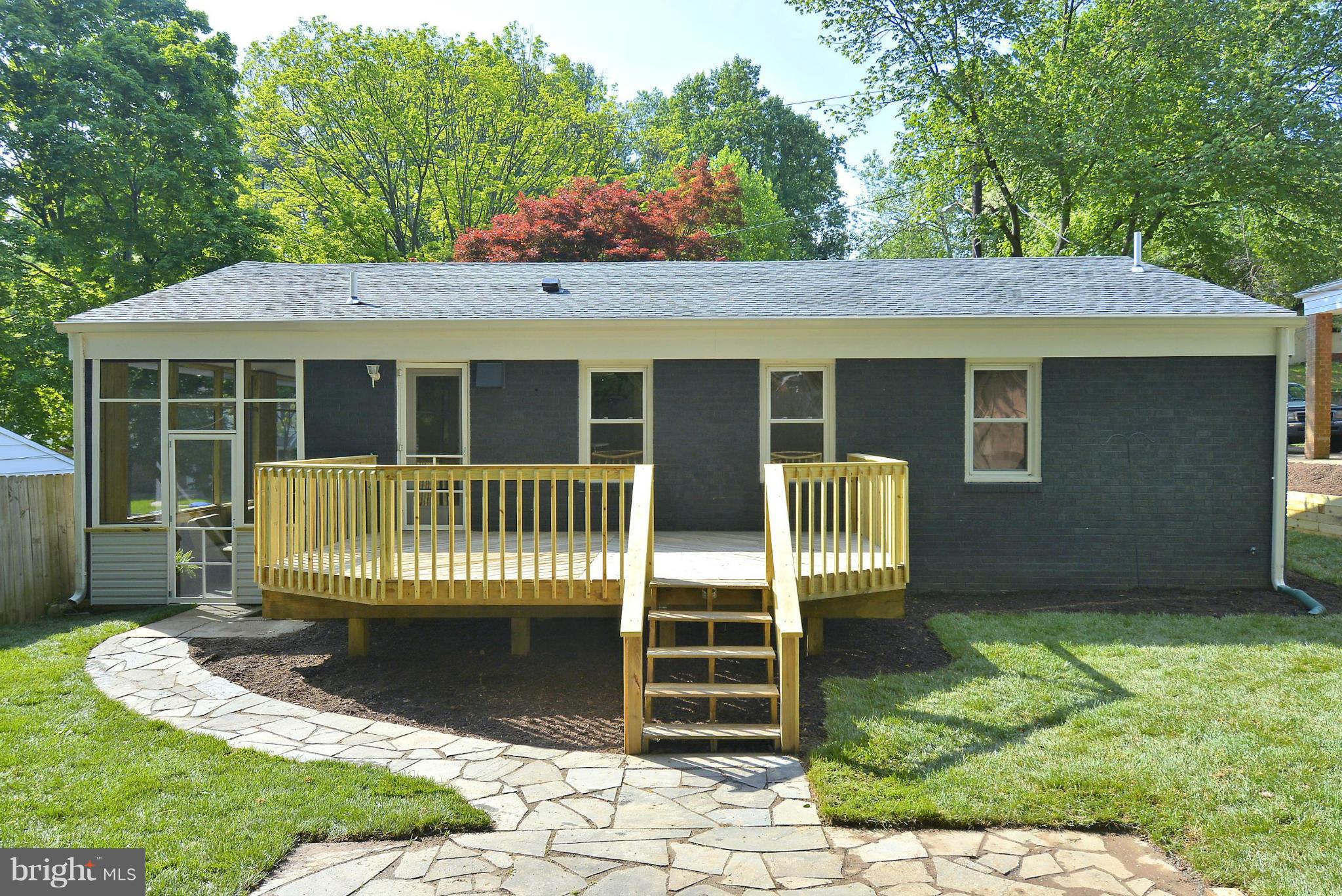 409 Branch Drive Silver Spring, MD 20901 - Photo 25 of 30 a front view of a house with a garden