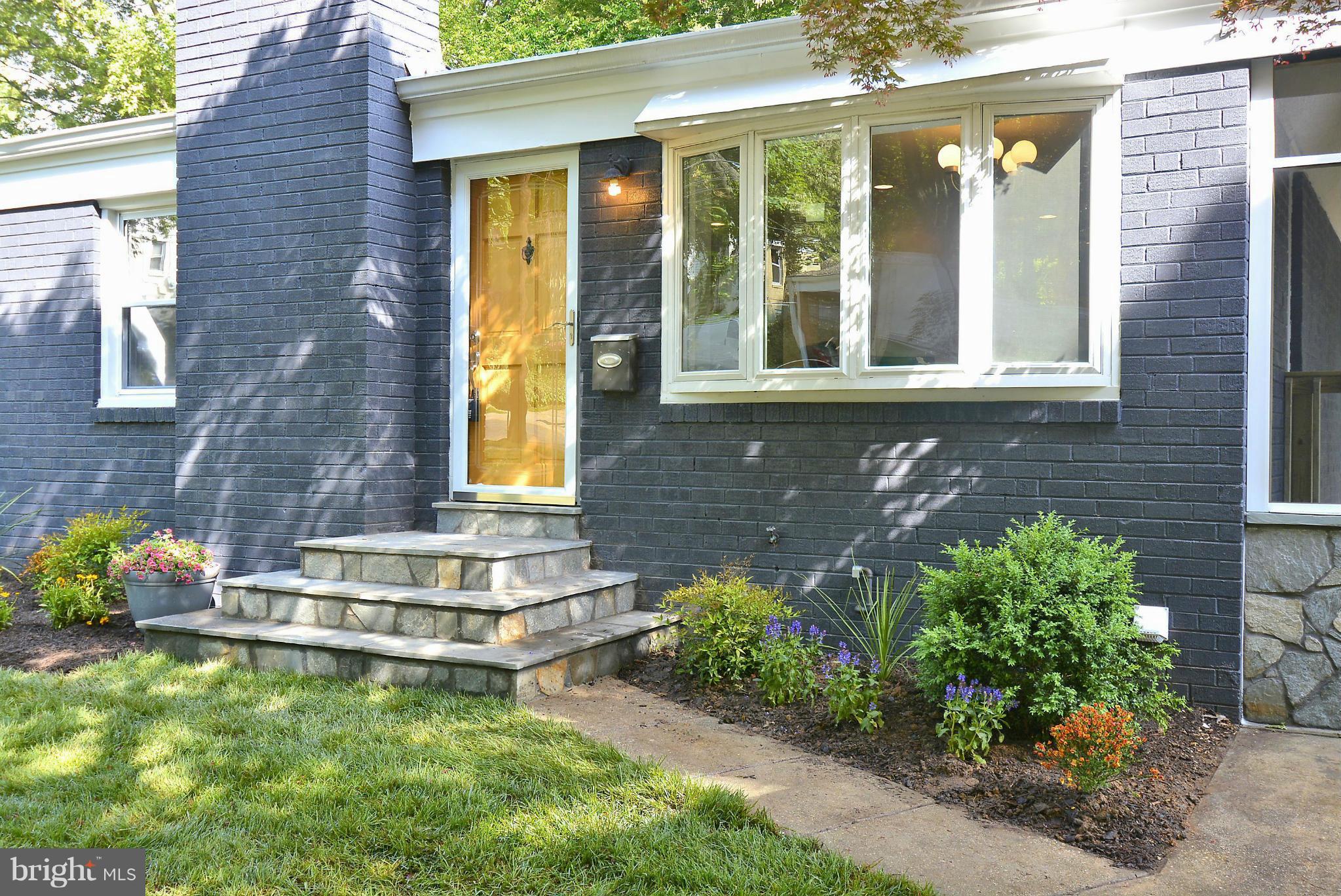 409 Branch Drive Silver Spring, MD 20901 - Photo 28 of 30 a front view of a house with a yard
