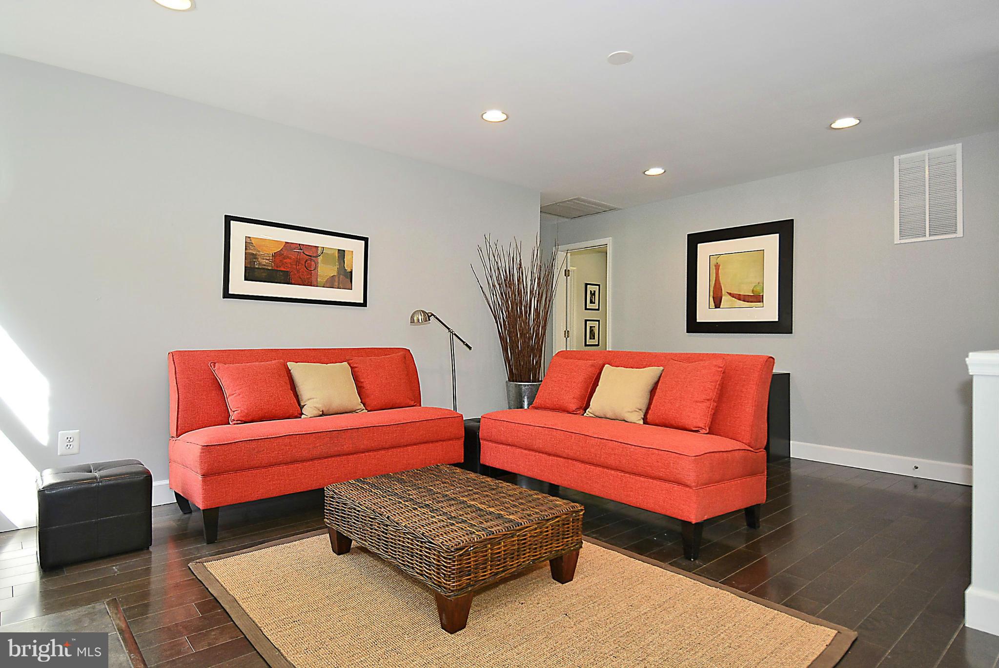 409 Branch Drive Silver Spring, MD 20901 - Photo 3 of 30 a living room with furniture and a night stand