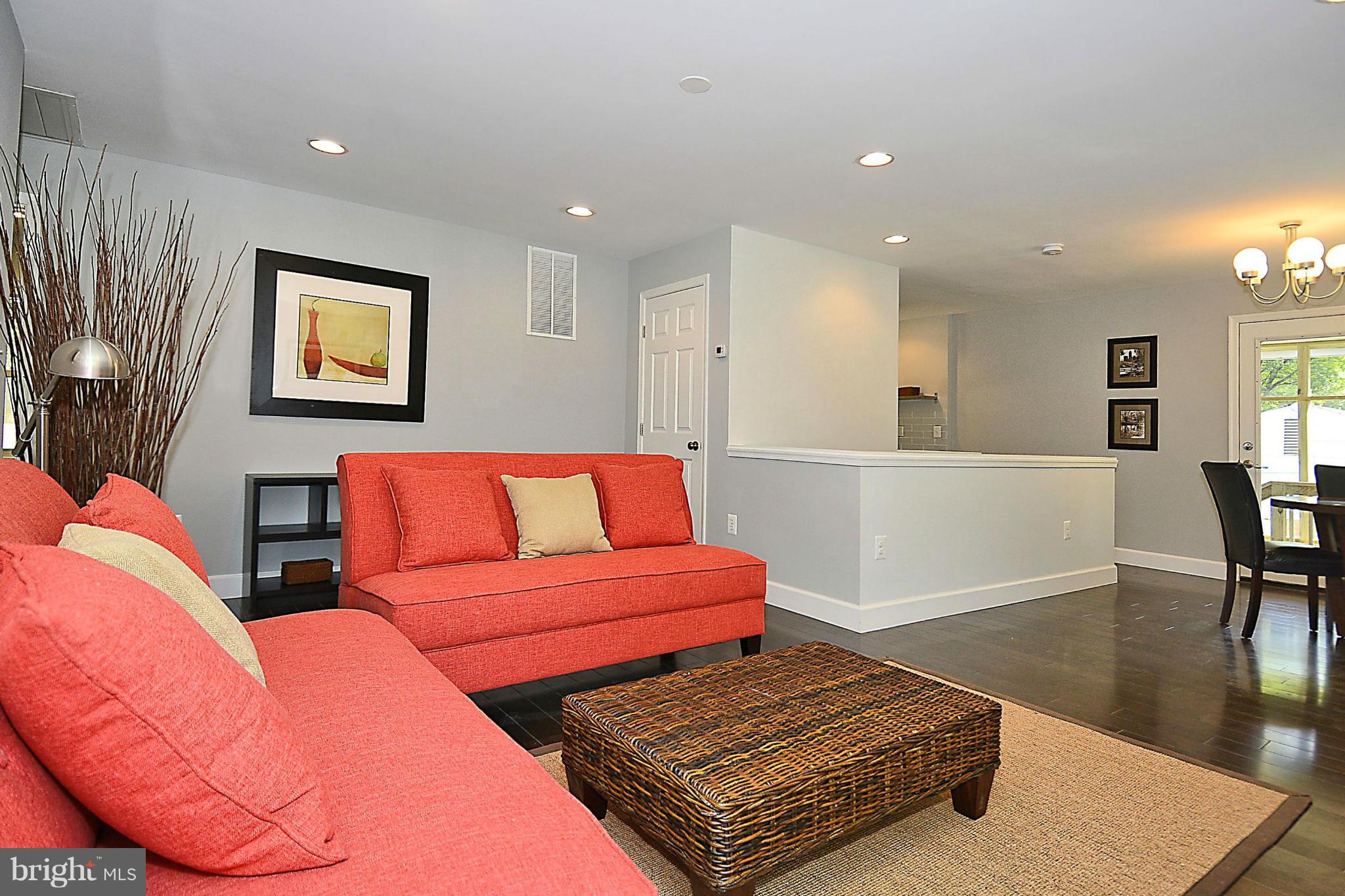 409 Branch Drive Silver Spring, MD 20901 - Photo 4 of 30 a living room with furniture and a wooden floor