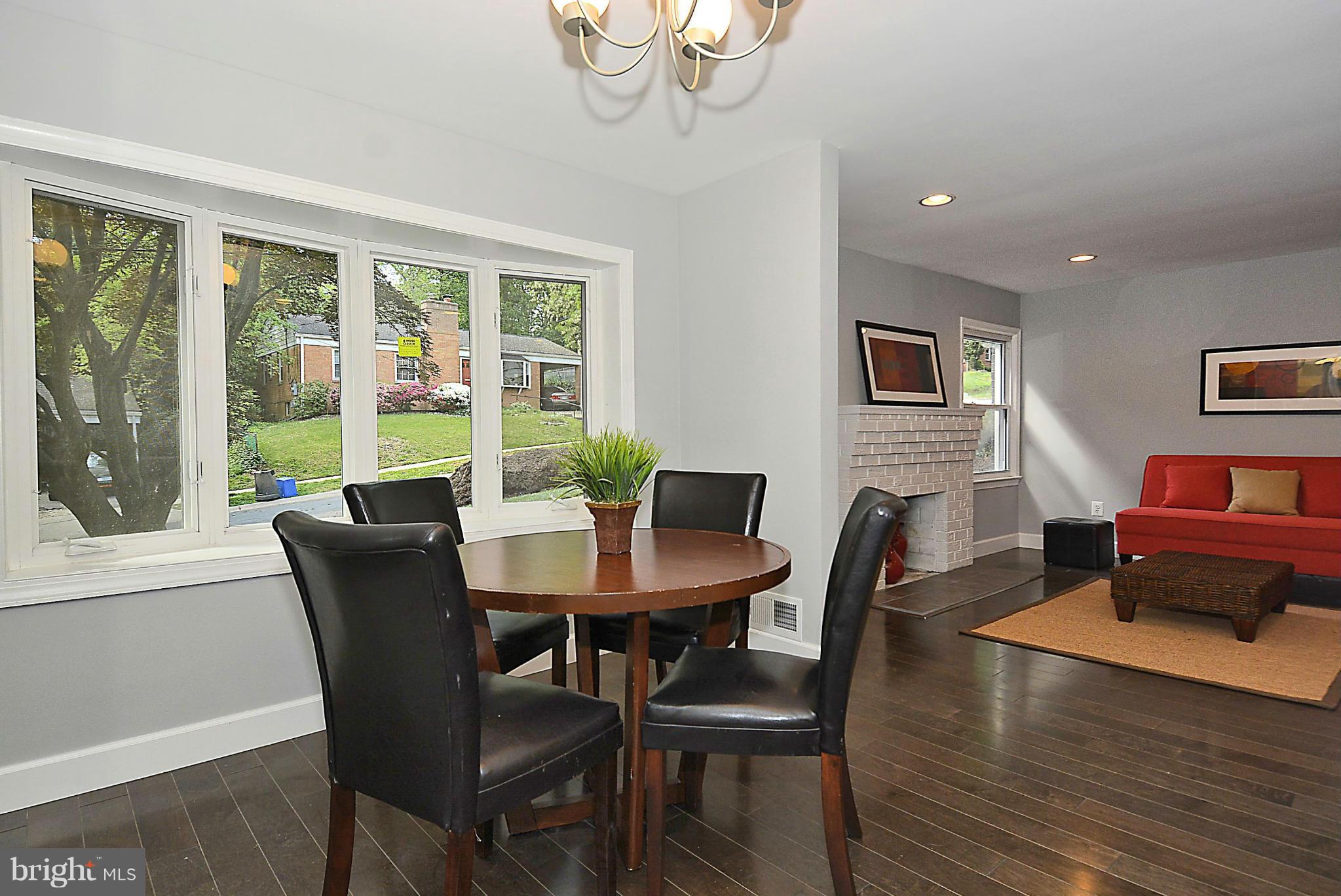 409 Branch Drive Silver Spring, MD 20901 - Photo 5 of 30 a view of a dining room with furniture window and wooden floor