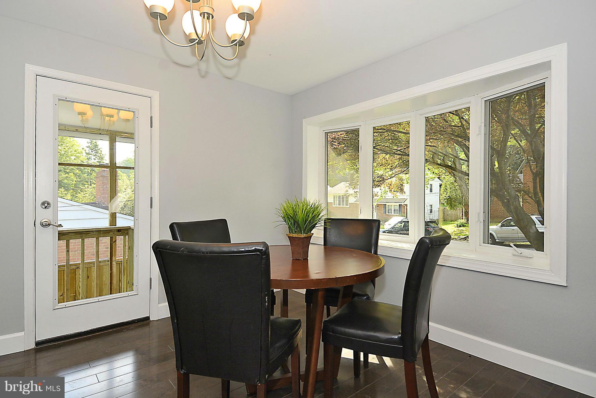 409 Branch Drive Silver Spring, MD 20901 - Photo 6 of 30 a view of a dining room with furniture window and wooden floor