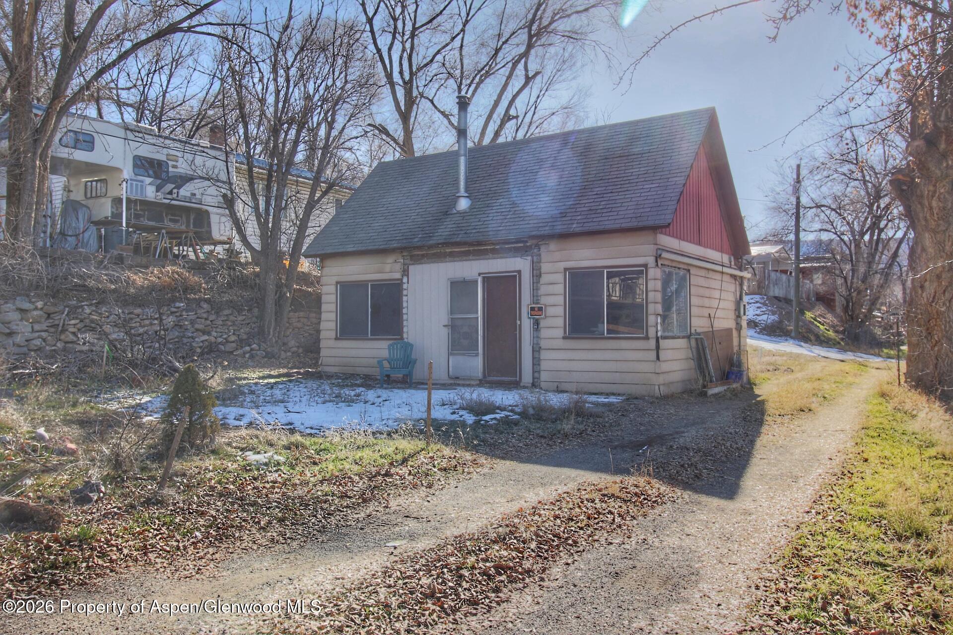 a view of a yard in front of a house
