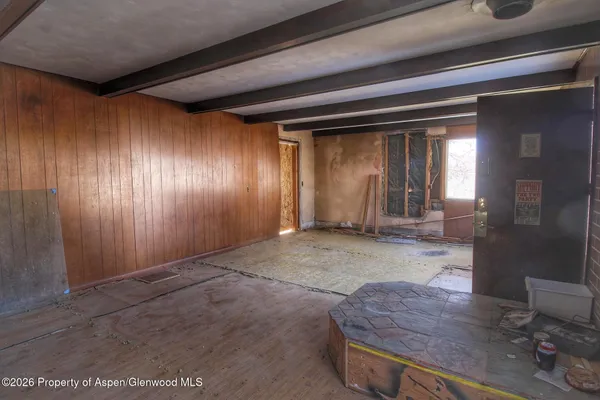 a view of livingroom with hardwood floor and a window