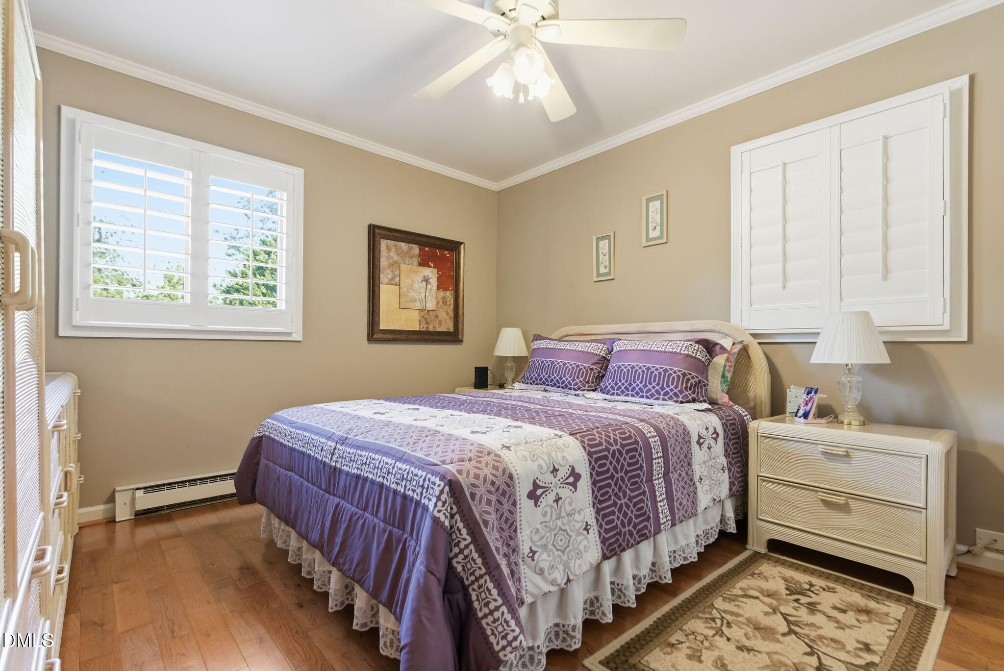 5210 Moncure Pittsboro Road Moncure, NC 27559 - Photo 17 of 58 a bedroom with a bed and a window