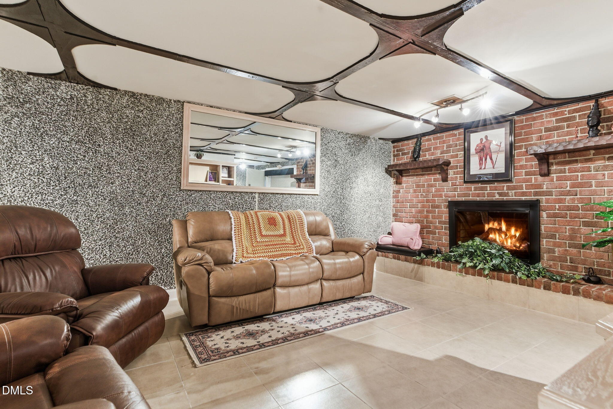 5210 Moncure Pittsboro Road Moncure, NC 27559 - Photo 25 of 58 a living room with furniture and a fireplace
