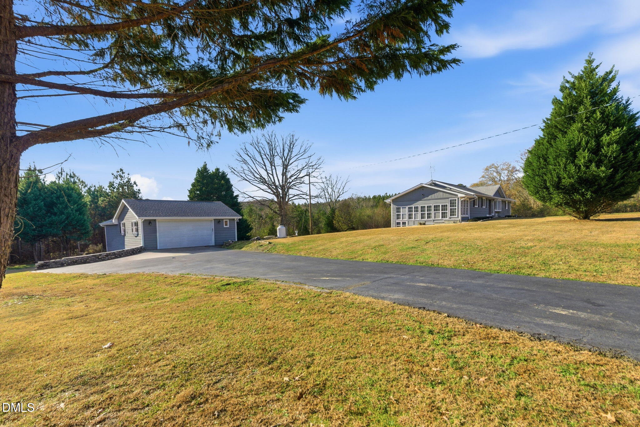 5210 Moncure Pittsboro Road Moncure, NC 27559 - Photo 45 of 58 a view of an house with swimming pool