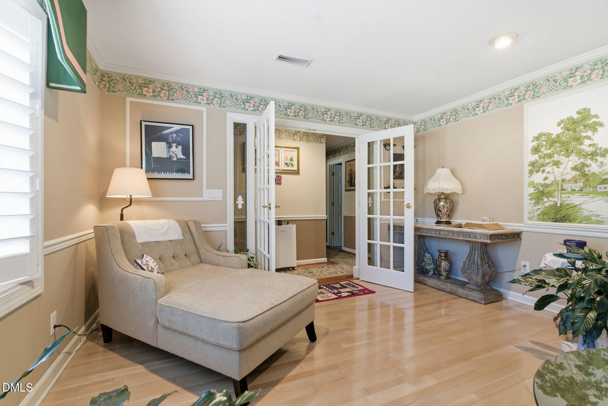 5210 Moncure Pittsboro Road Moncure, NC 27559 - Photo 7 of 58 a living room with furniture and a wooden floor