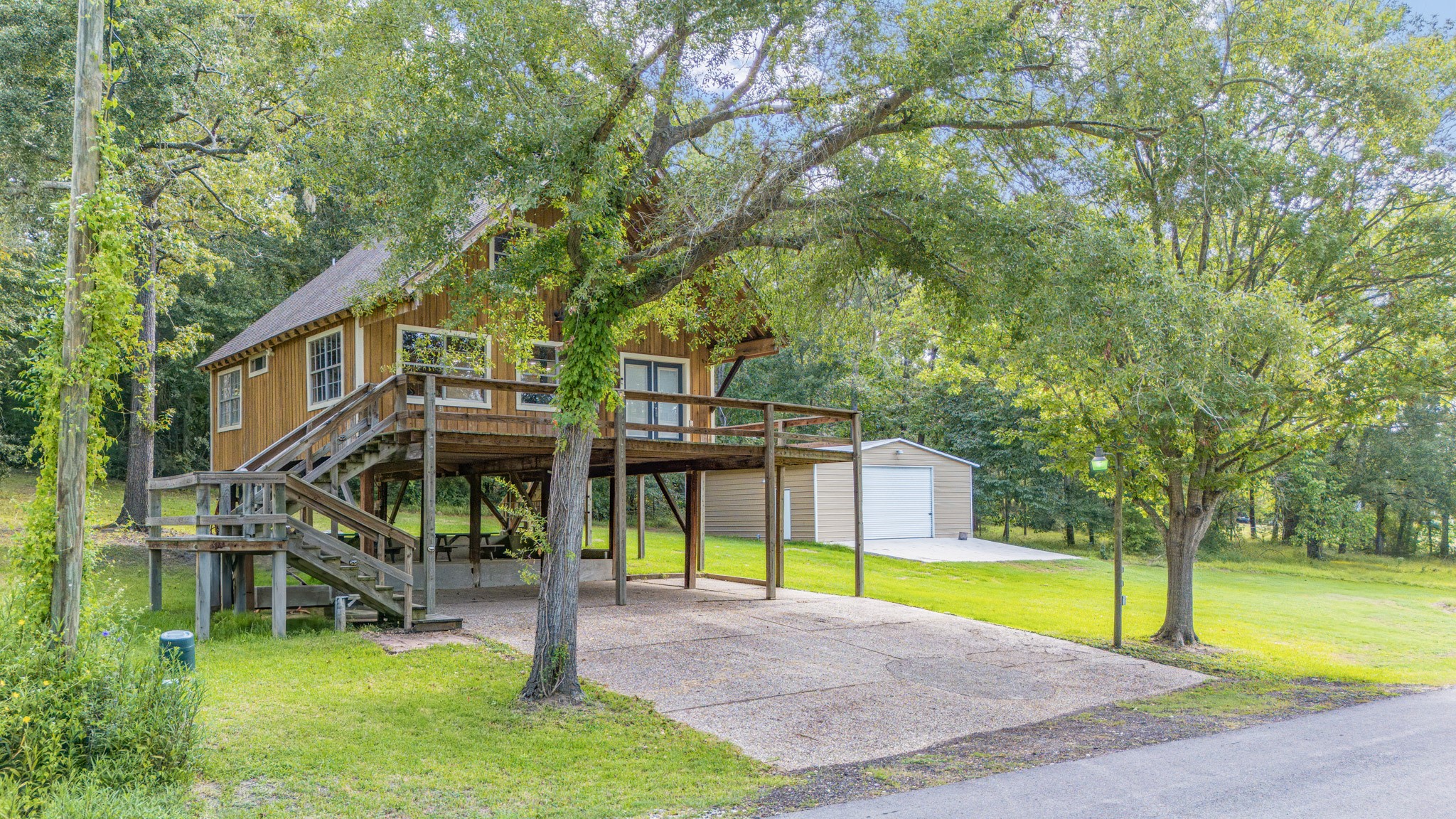 161 White Oak Street Point Blank, TX 77364 - Photo 4 of 23 a view of a house with swimming pool and sitting area
