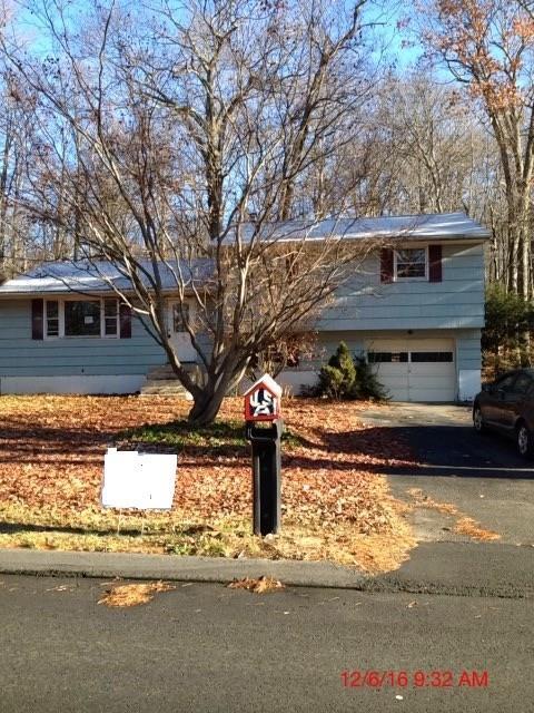 28 Bound Line Road Wolcott, CT 06716 - Photo 1 of 1 a front view of a house with a yard