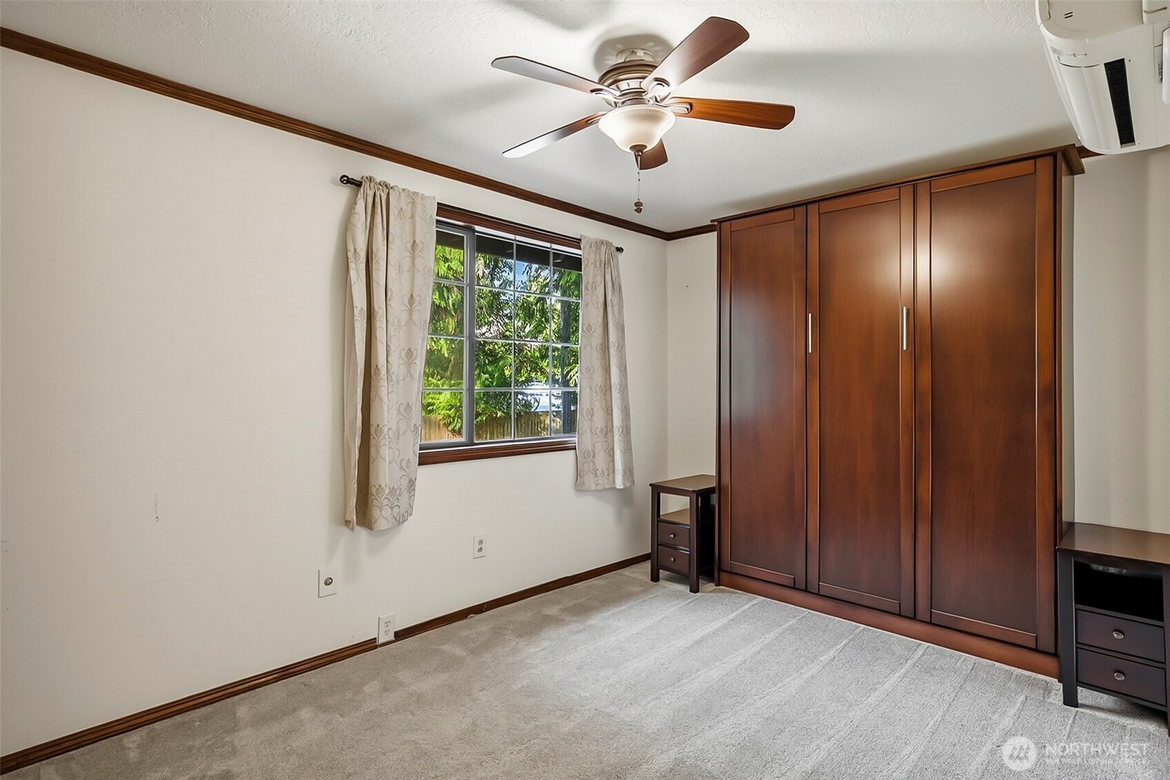16719 1st Avenue Southeast Bothell, WA 98012 - Photo 20 of 33 an empty room with windows and fan
