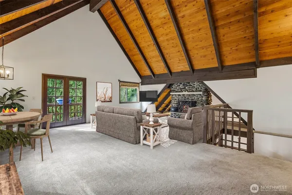 a view of livingroom with furniture and staircase