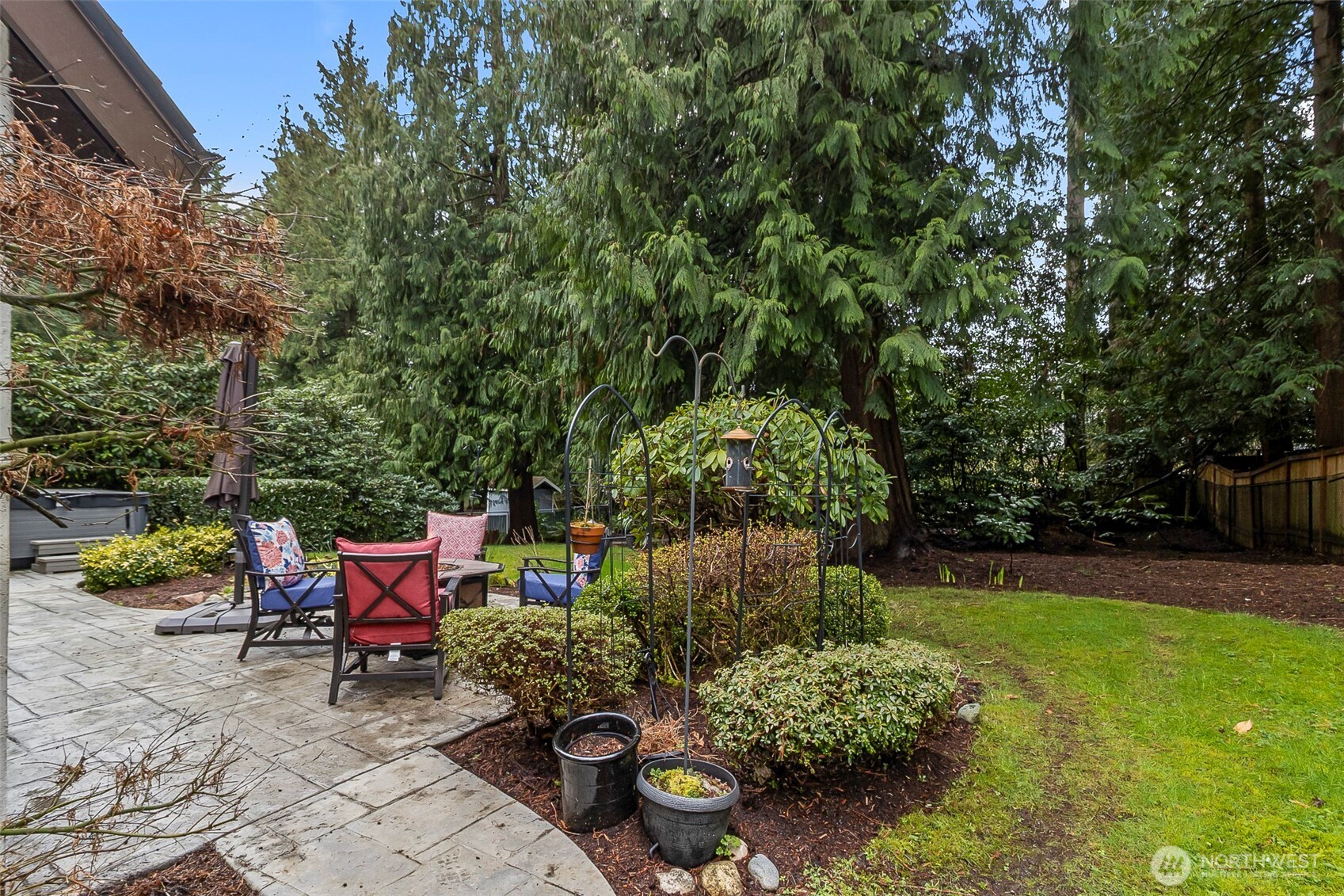 16719 1st Avenue Southeast Bothell, WA 98012 - Photo 26 of 33 a backyard of a house with outdoor seating