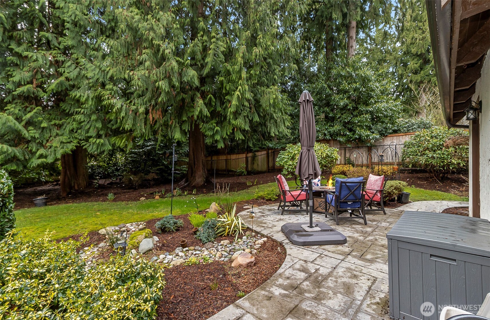 16719 1st Avenue Southeast Bothell, WA 98012 - Photo 28 of 33 a view of a backyard with sitting area furniture and garden