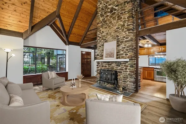 a outdoor space with patio the couches and a fireplace