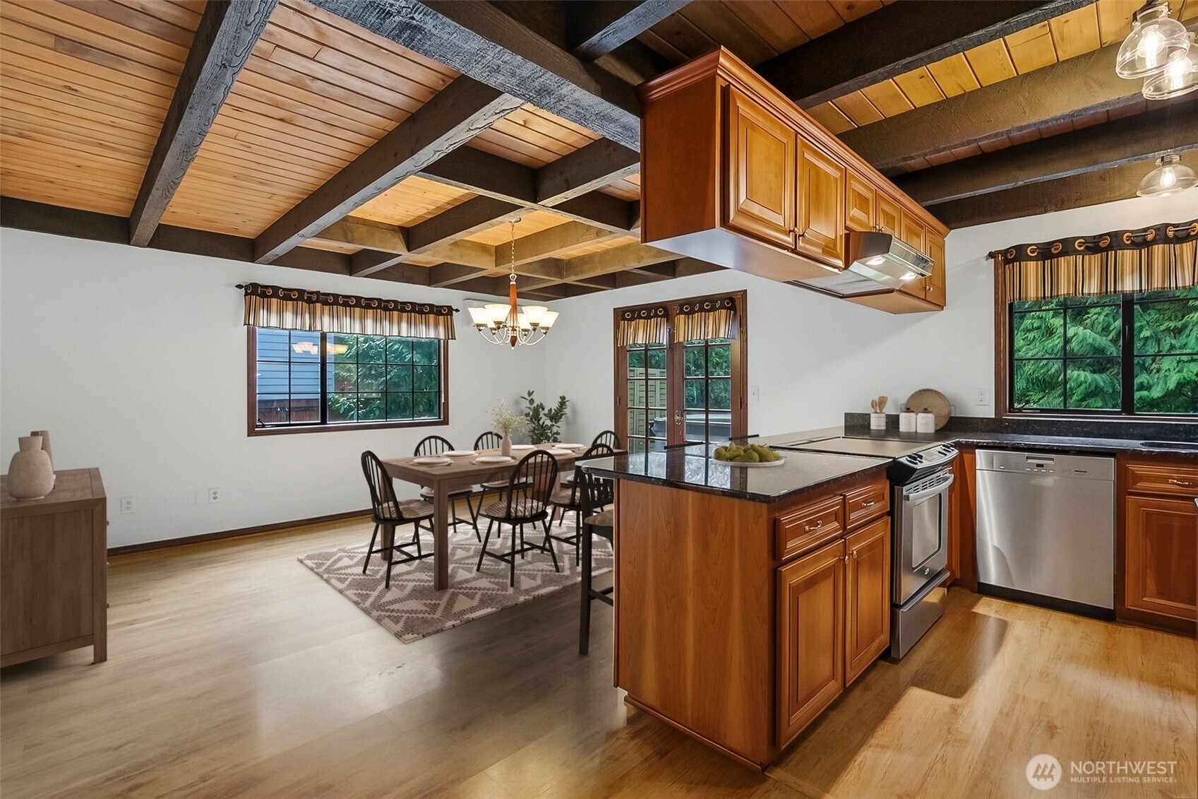 16719 1st Avenue Southeast Bothell, WA 98012 - Photo 10 of 33 a kitchen with stainless steel appliances granite countertop a stove and a refrigerator