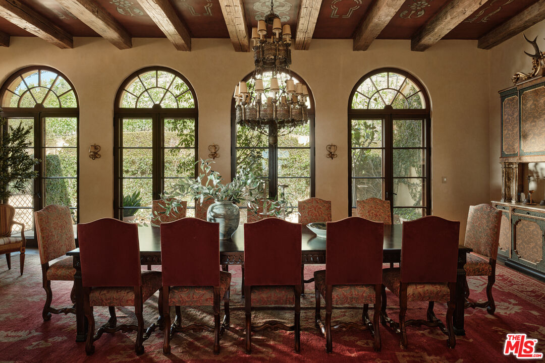 10939 Chalon Road Los Angeles, CA 90077 - Photo 10 of 24 a view of a dining room with furniture window and outside view