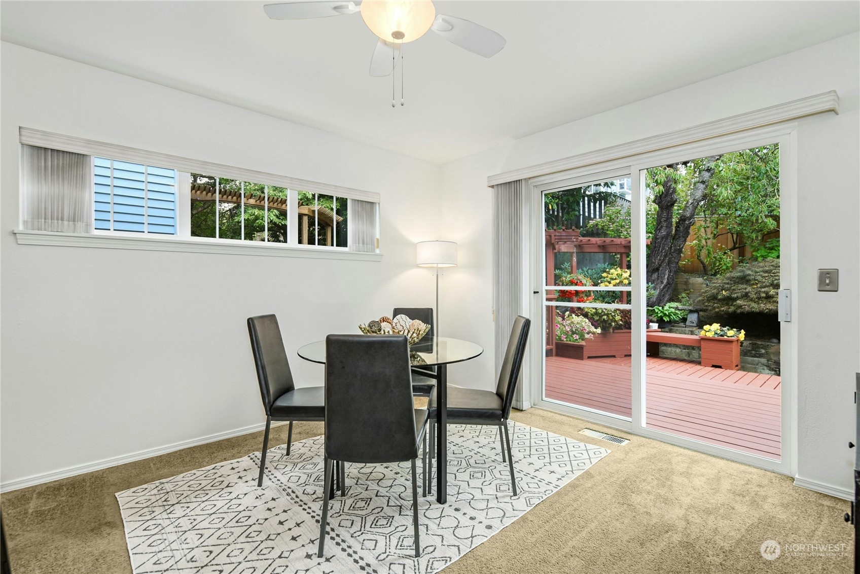 1310 North 41st Street, Unit B Seattle, WA 98103 - Photo 11 of 40 a view of a dining room with furniture and window