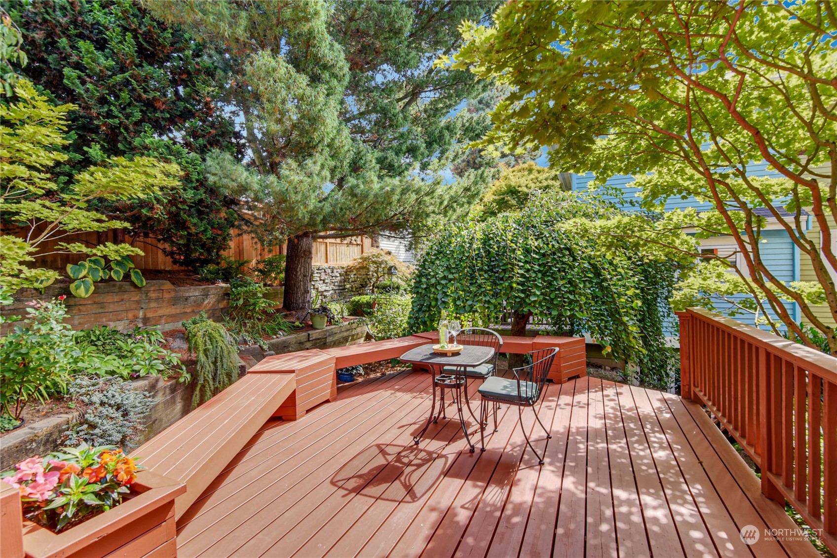 1310 North 41st Street, Unit B Seattle, WA 98103 - Photo 15 of 40 a view of a patio with couches table and chairs and potted plants