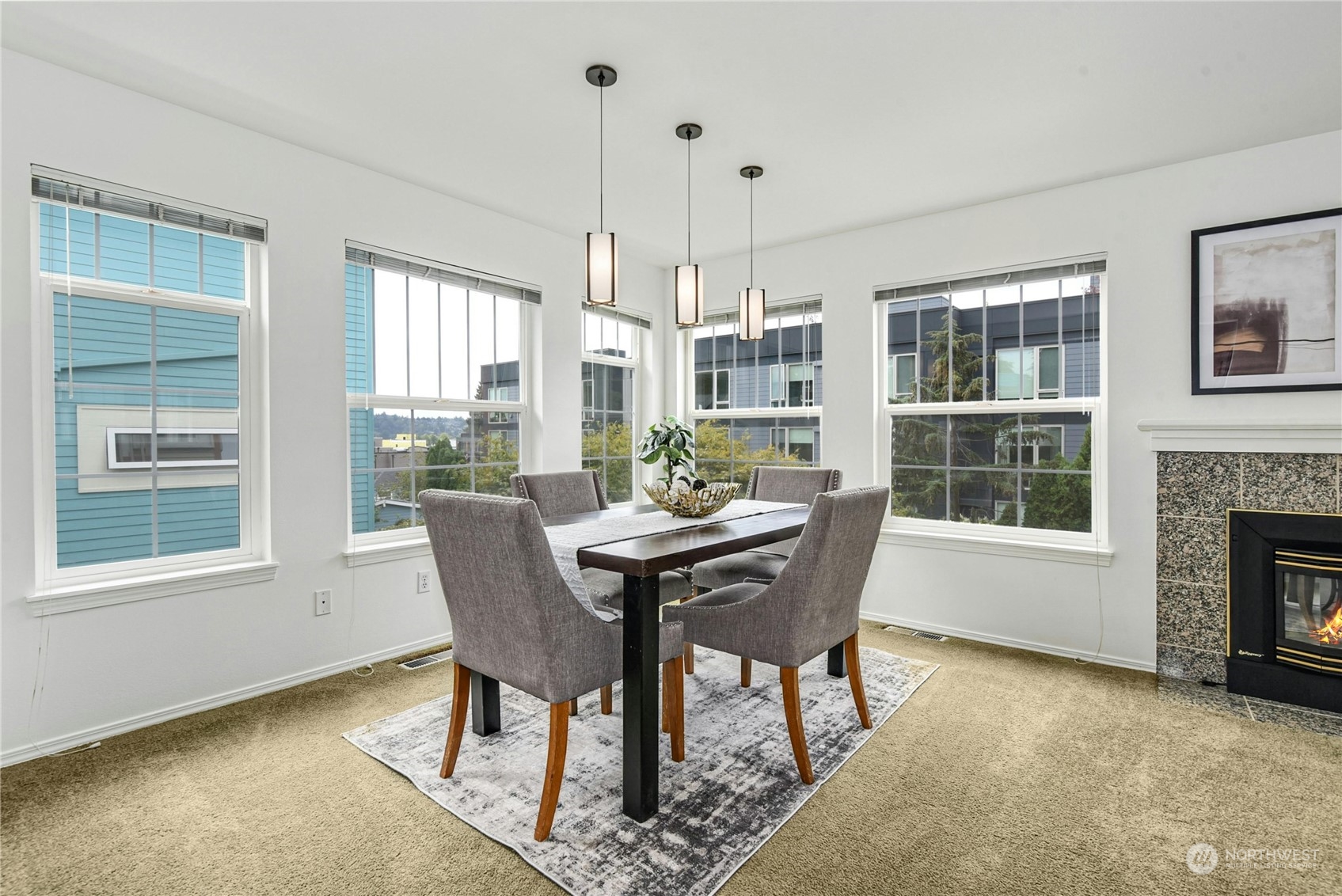 1310 North 41st Street, Unit B Seattle, WA 98103 - Photo 18 of 40 a dining room with furniture window wooden floor