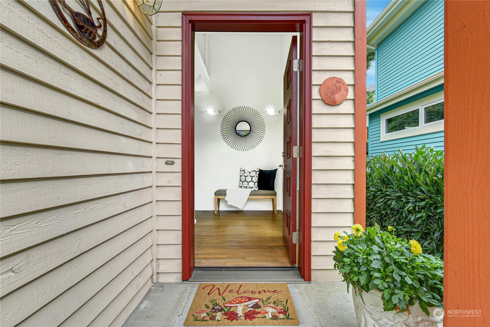 1310 North 41st Street, Unit B Seattle, WA 98103 - Photo 2 of 40 a front view of a house with a garden