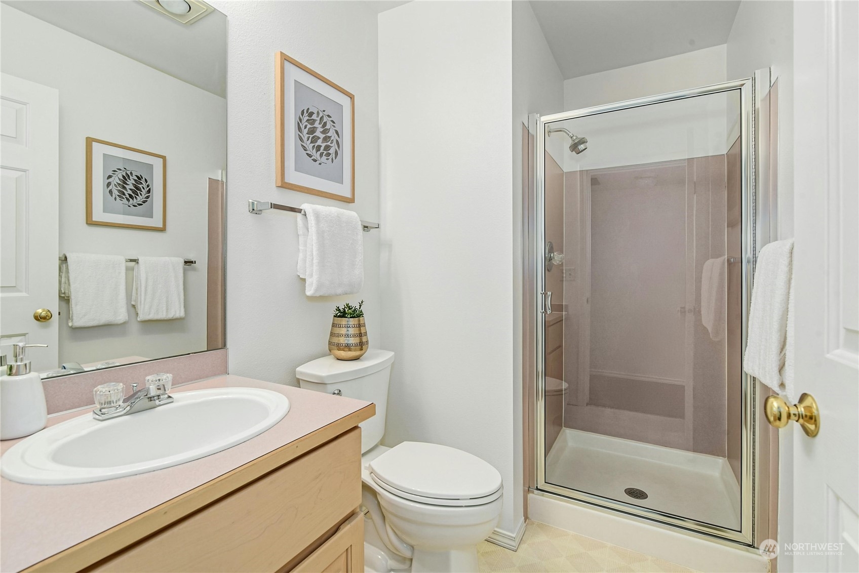 1310 North 41st Street, Unit B Seattle, WA 98103 - Photo 31 of 40 a bathroom with a sink toilet and shower