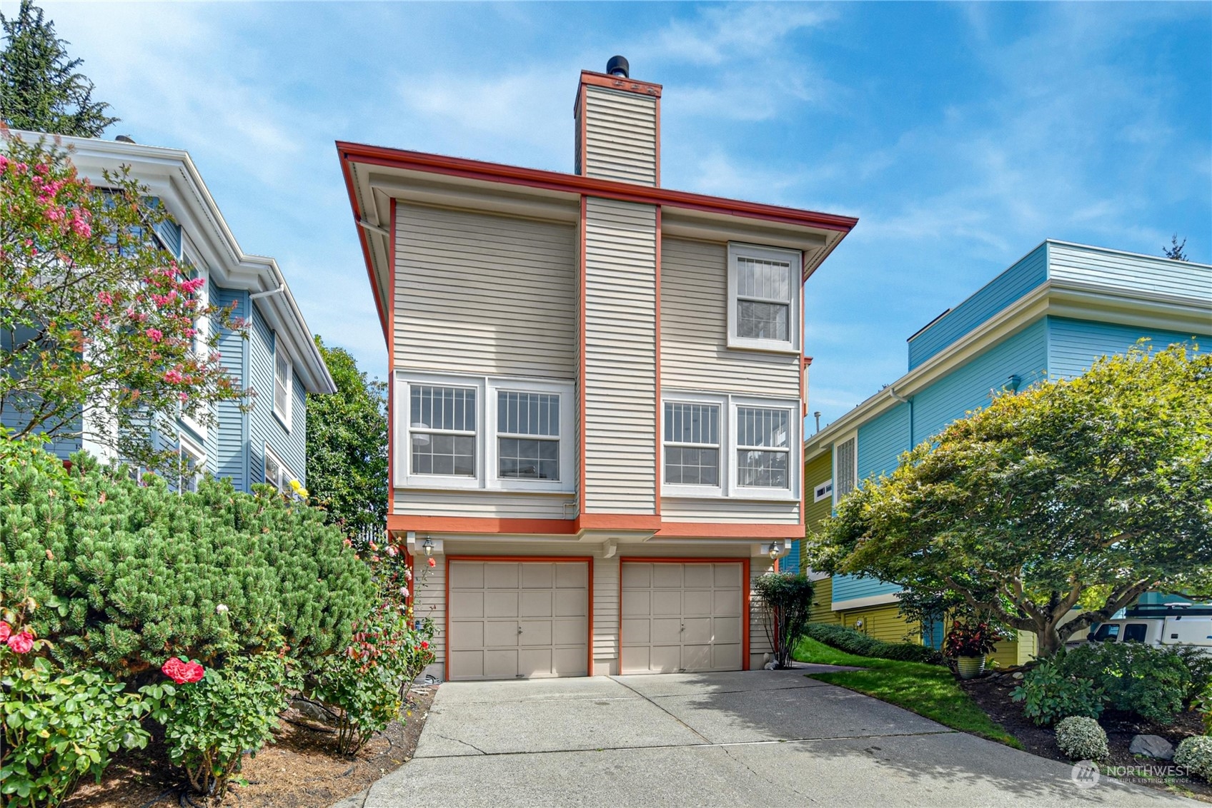1310 North 41st Street, Unit B Seattle, WA 98103 - Photo 32 of 40 a front view of a house with plants