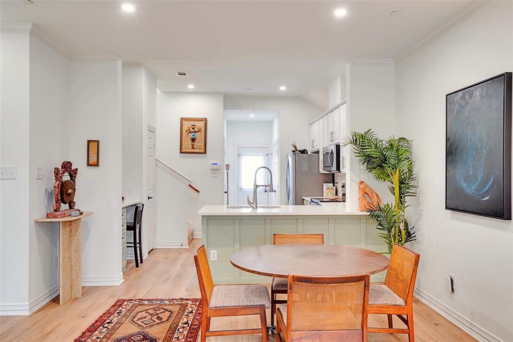 5713 Butterfly Way Fairview, TX 75069 - Photo 3 of 32 a view of a dining room with furniture and a potted plant