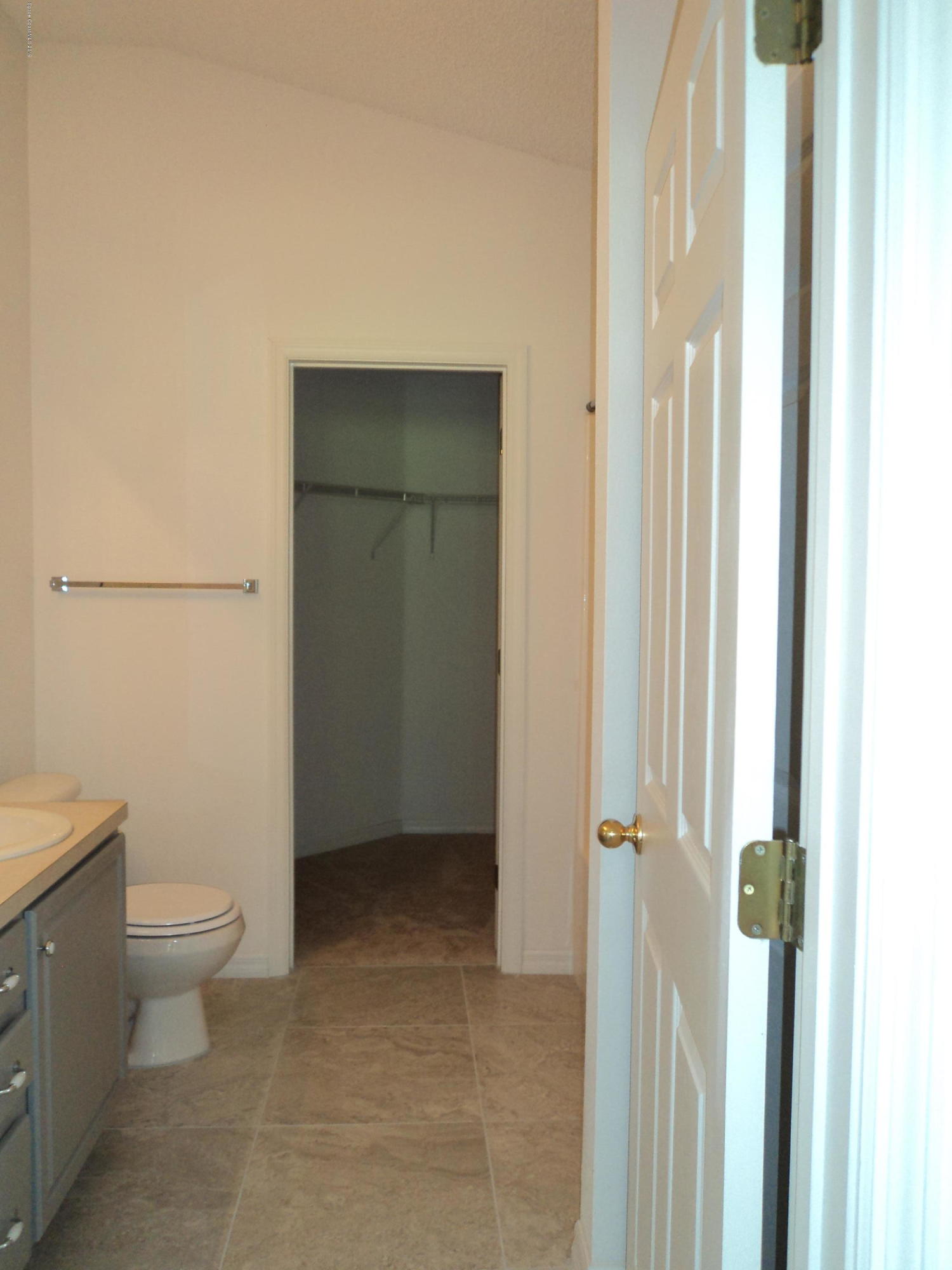 1685 Wacker Avenue Southeast Palm Bay, FL 32909 - Photo 11 of 30 a bathroom with a toilet
