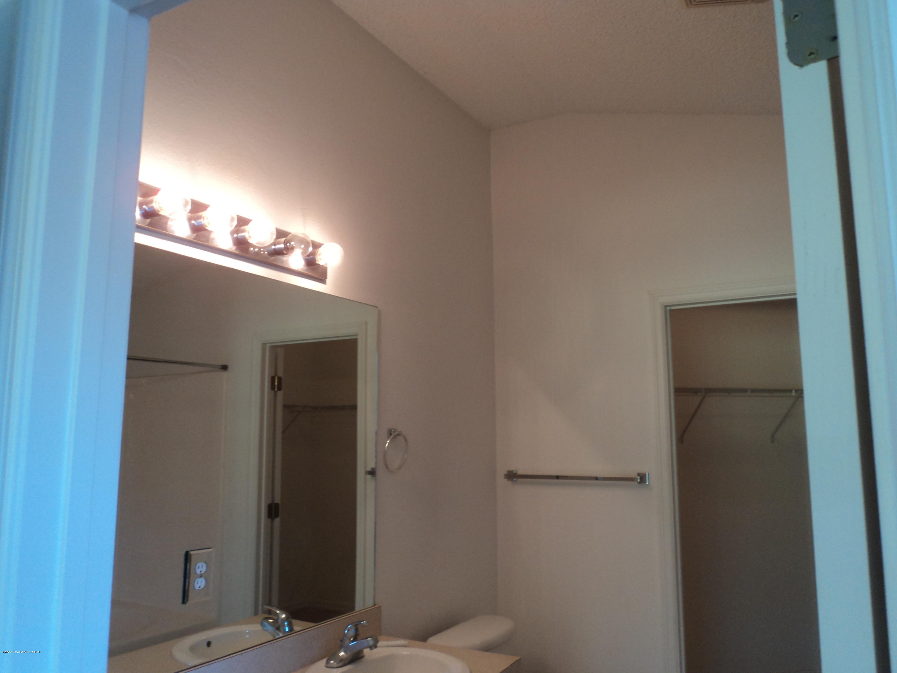 1685 Wacker Avenue Southeast Palm Bay, FL 32909 - Photo 15 of 30 a view of a closet area