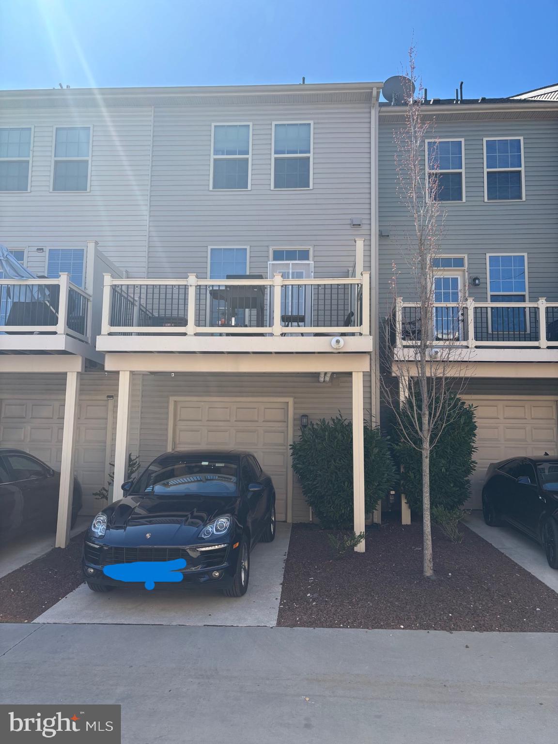 1728 Lantern Mews Baltimore, MD 21205 - Photo 14 of 16 a car parked in front of a building