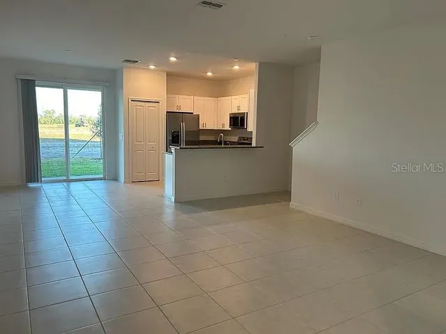 a view of kitchen with a sink