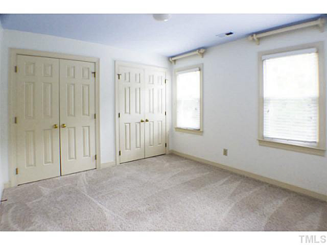 107 Kings Fork Road Cary, NC 27511 - Photo 16 of 25 Second bedroom has wonderful closet space.