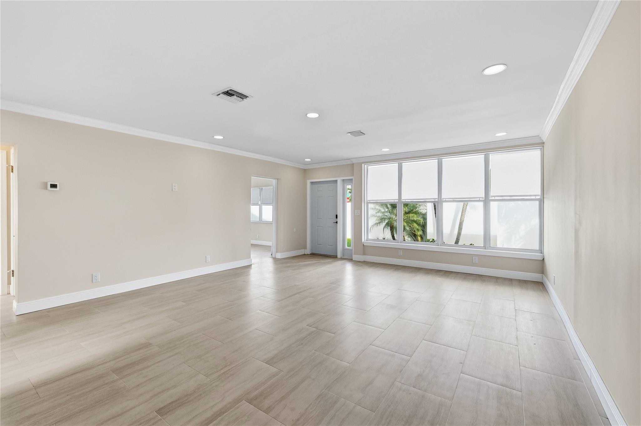 2000 Northeast 17th Street Fort Lauderdale, FL 33305 - Photo 11 of 44 wooden floor in an empty room with a window