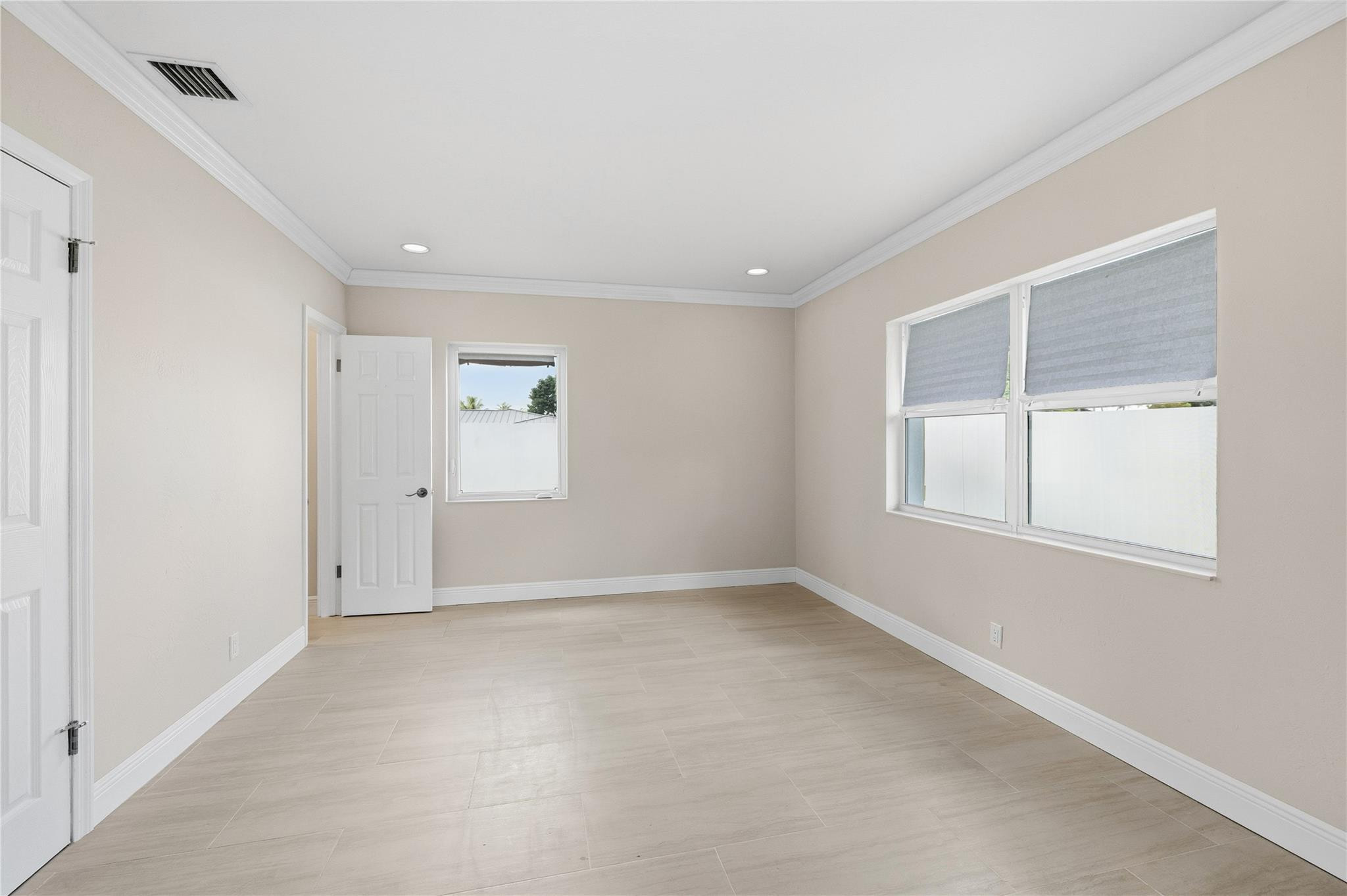 2000 Northeast 17th Street Fort Lauderdale, FL 33305 - Photo 16 of 44 an empty room with windows