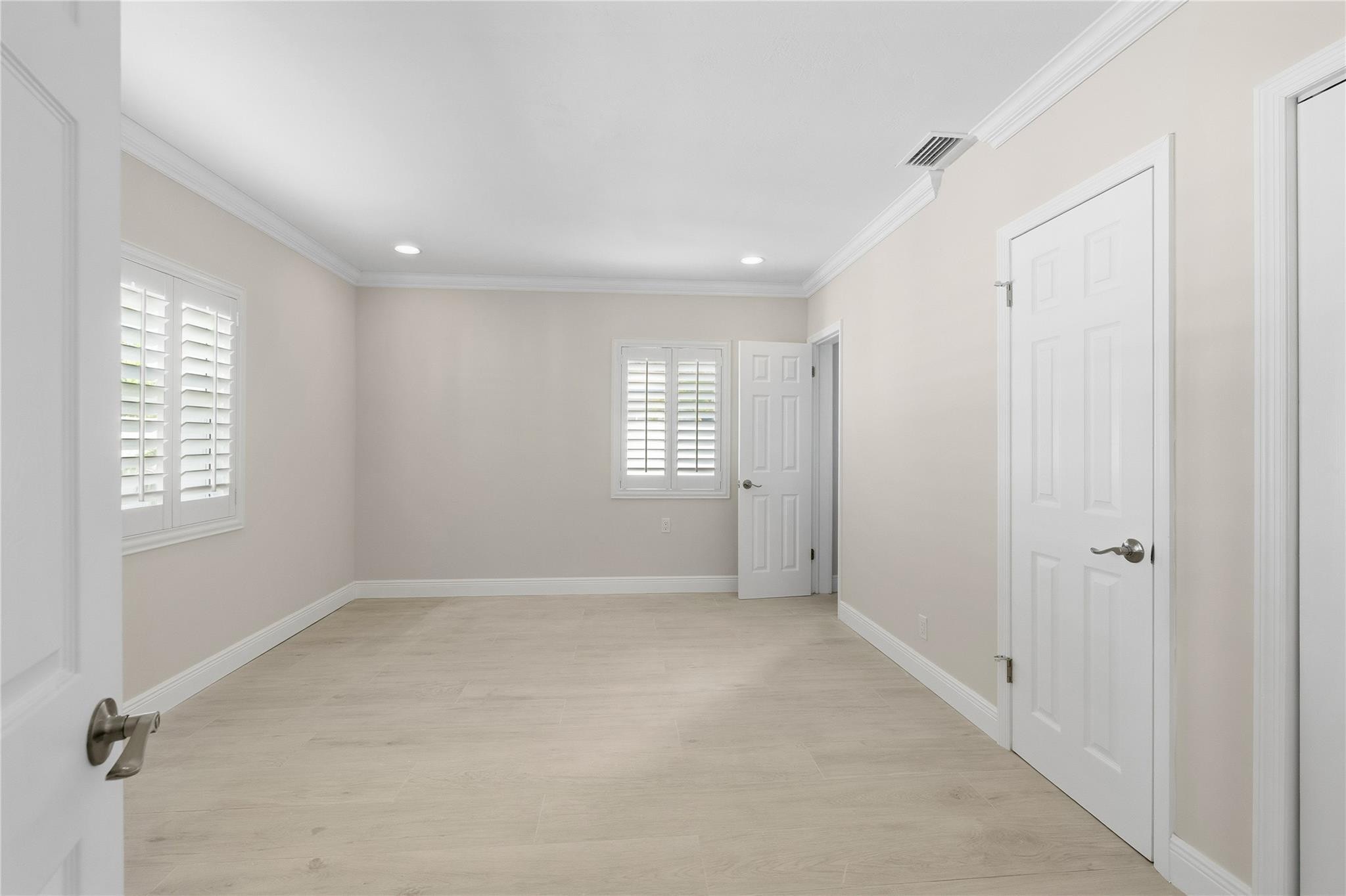 2000 Northeast 17th Street Fort Lauderdale, FL 33305 - Photo 27 of 44 an empty room with windows