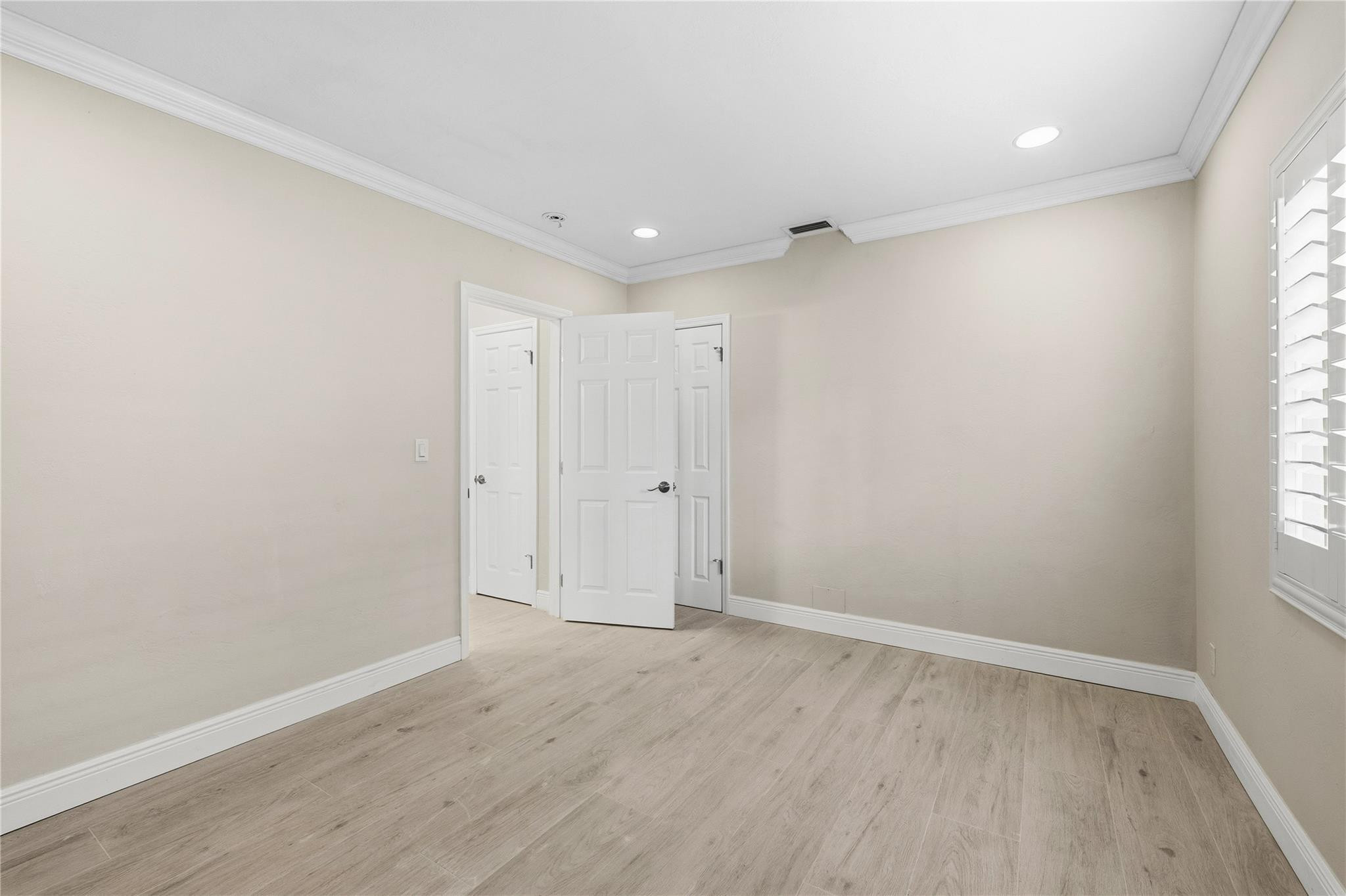 2000 Northeast 17th Street Fort Lauderdale, FL 33305 - Photo 36 of 44 wooden floor in an empty room with a window