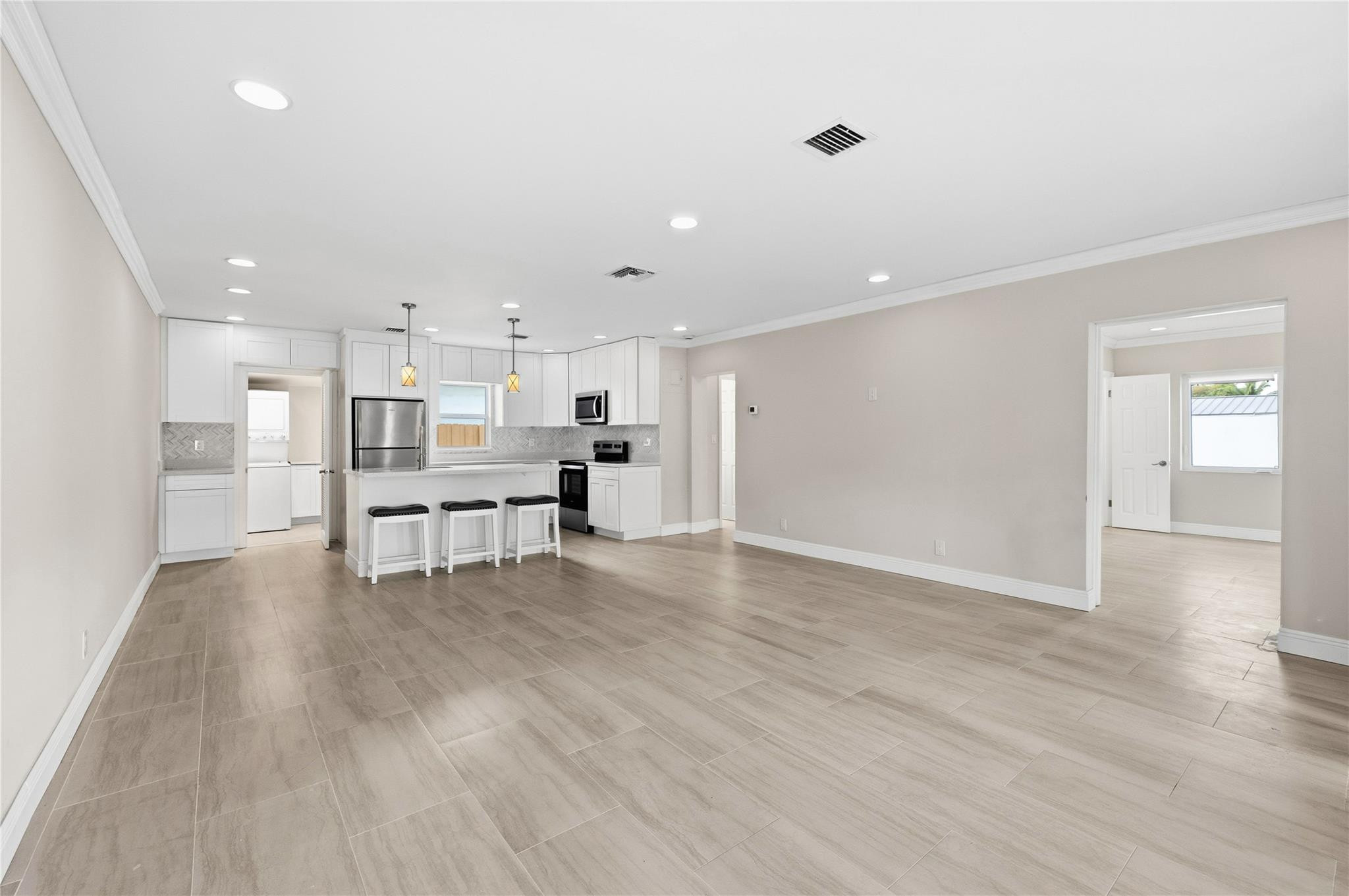 2000 Northeast 17th Street Fort Lauderdale, FL 33305 - Photo 10 of 44 a view of kitchen with wooden floor