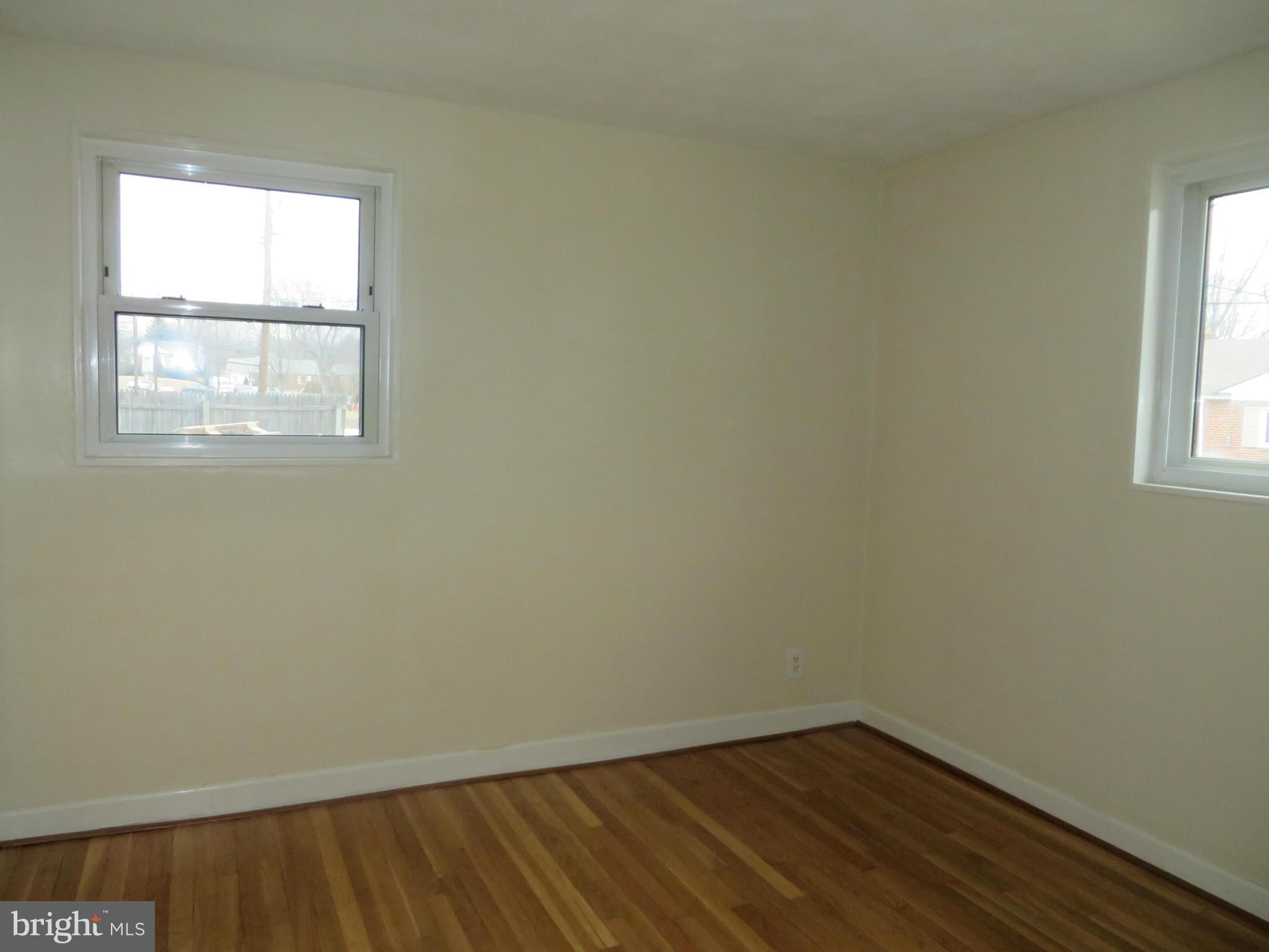 12200 Edgemont Street Silver Spring, MD 20902 - Photo 8 of 12 an empty room with a window