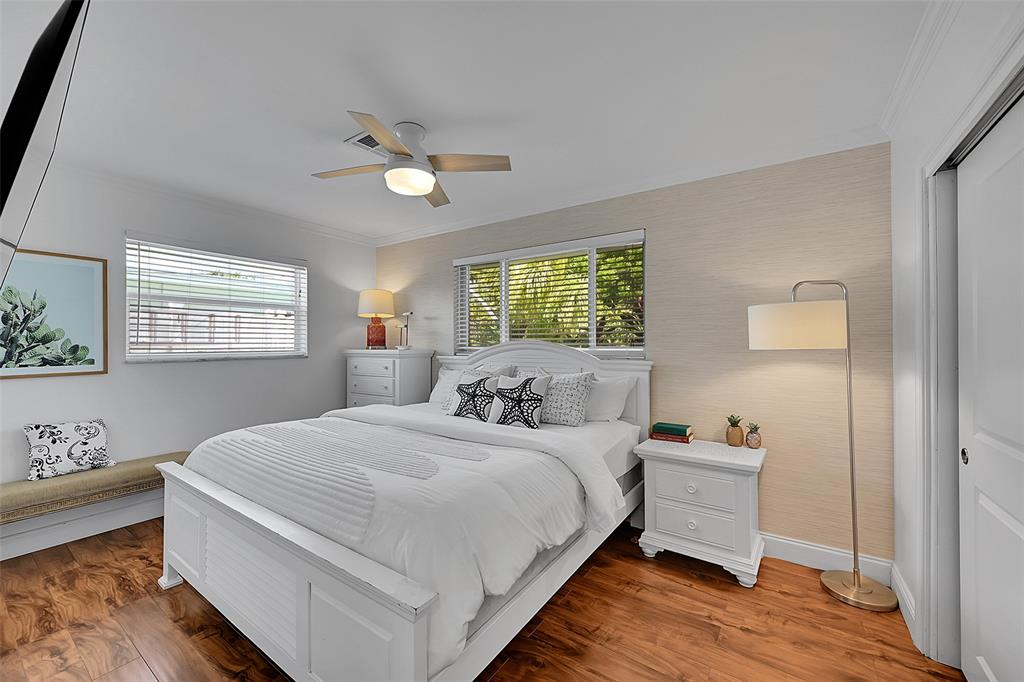 1080 Southeast 9th Avenue Pompano Beach, FL 33060 - Photo 23 of 53 a bedroom with a bed and a window