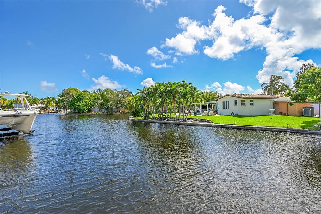 1080 Southeast 9th Avenue Pompano Beach, FL 33060 - Photo 37 of 53 a view of a house with a yard