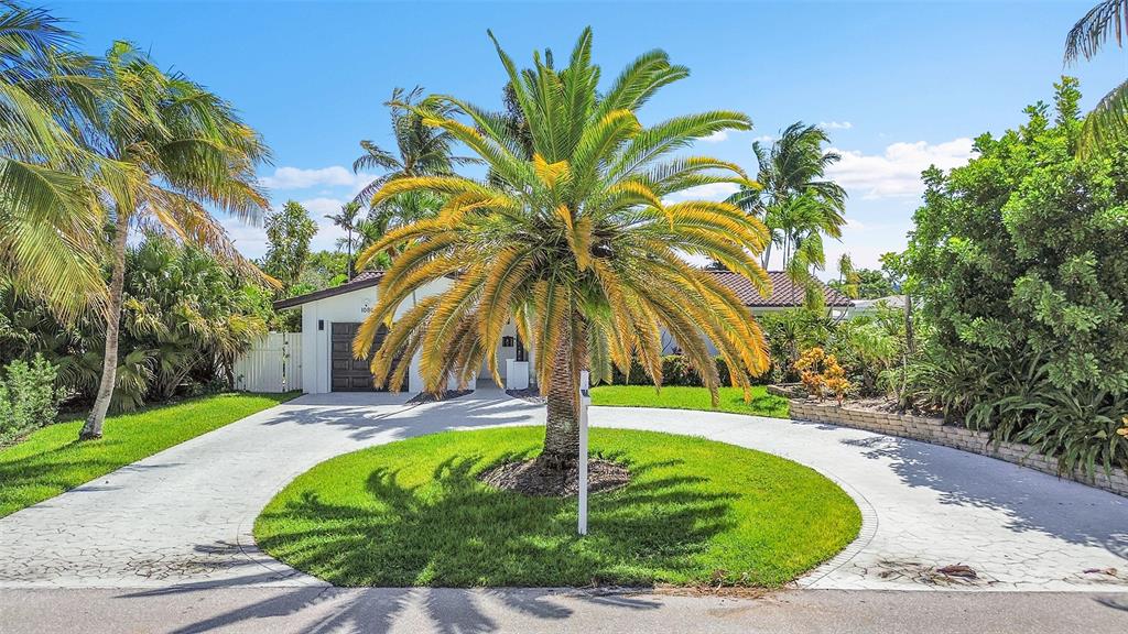 1080 Southeast 9th Avenue Pompano Beach, FL 33060 - Photo 42 of 53 a swimming pool with outdoor seating and yard