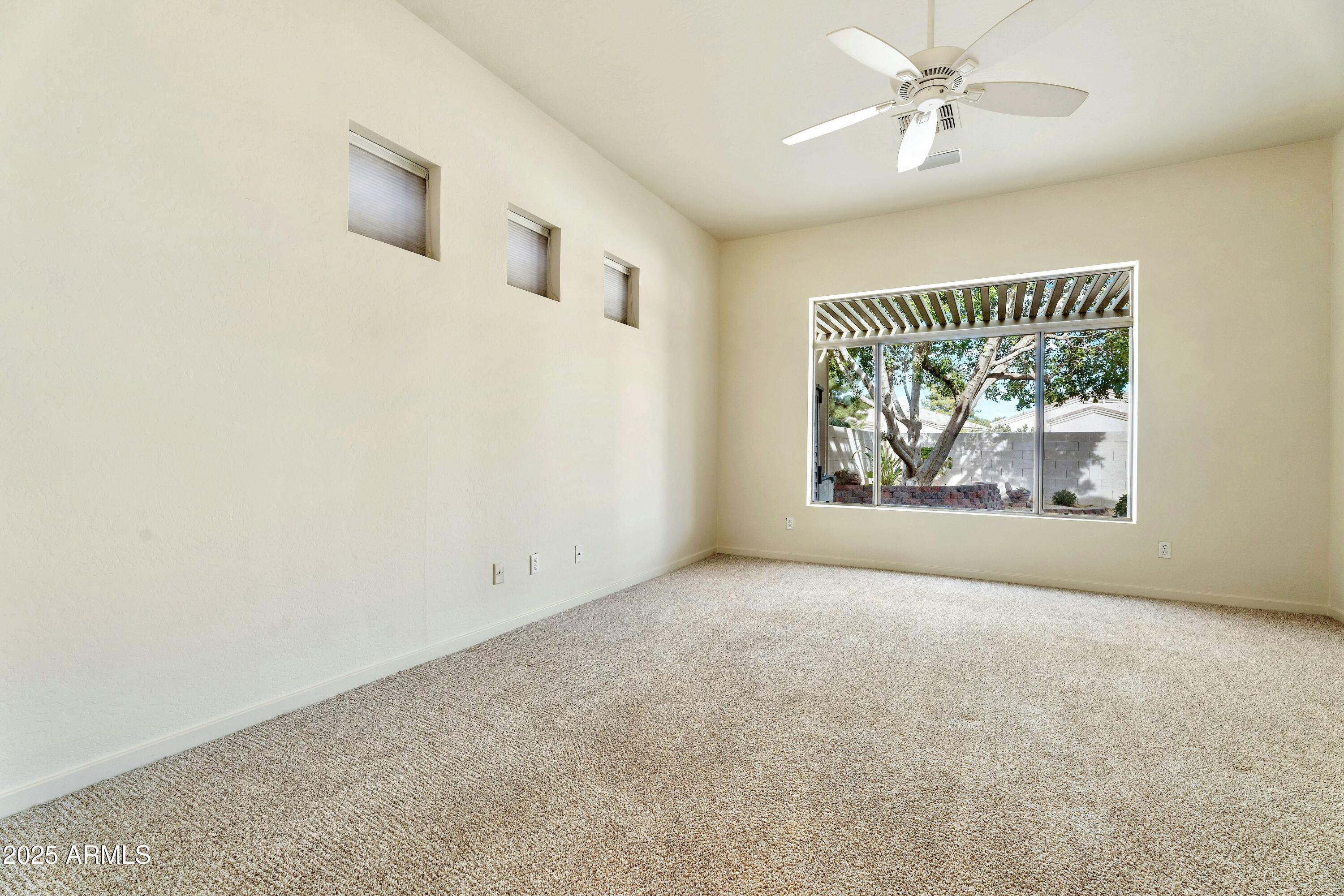 3830 East Carter Drive Phoenix, AZ 85042 - Photo 13 of 30 a view of an empty room with a window