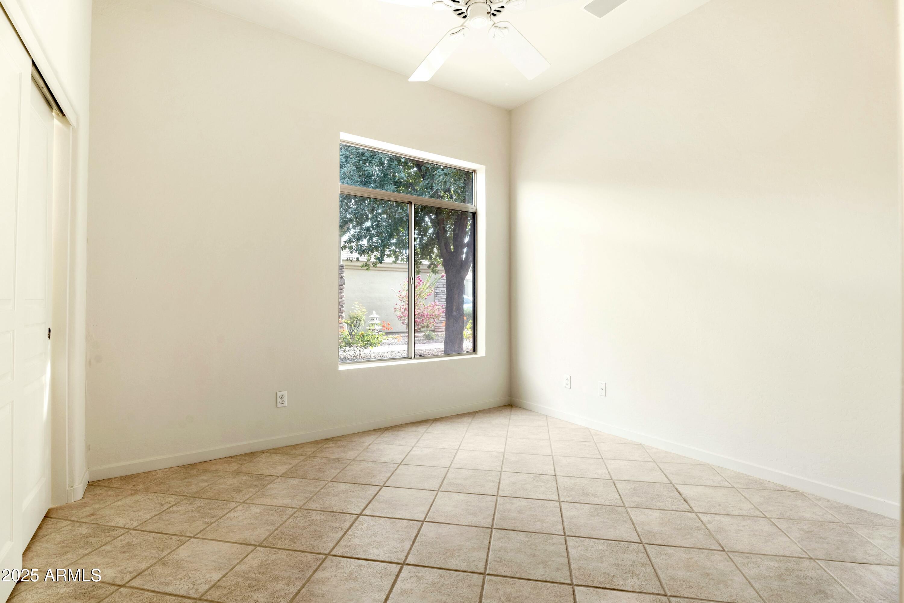 3830 East Carter Drive Phoenix, AZ 85042 - Photo 21 of 30 a view of an empty room with a window