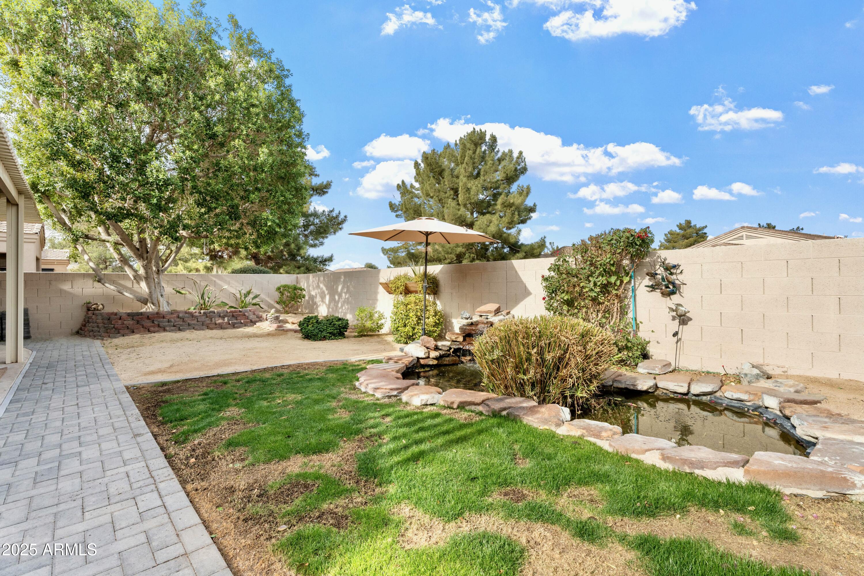 3830 East Carter Drive Phoenix, AZ 85042 - Photo 25 of 30 a view of a backyard with sitting area