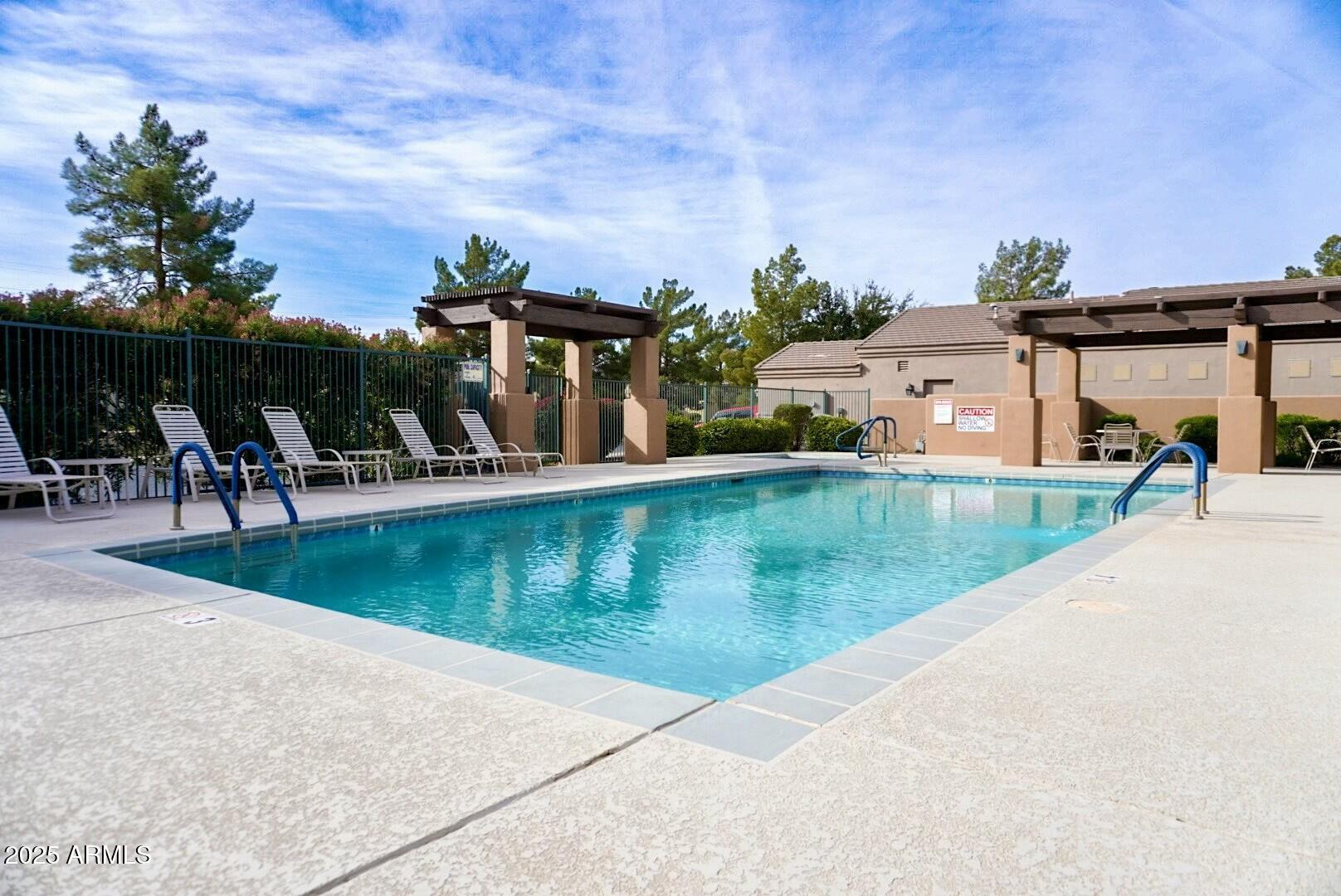 3830 East Carter Drive Phoenix, AZ 85042 - Photo 26 of 30 an outdoor space with swimming pool and furniture