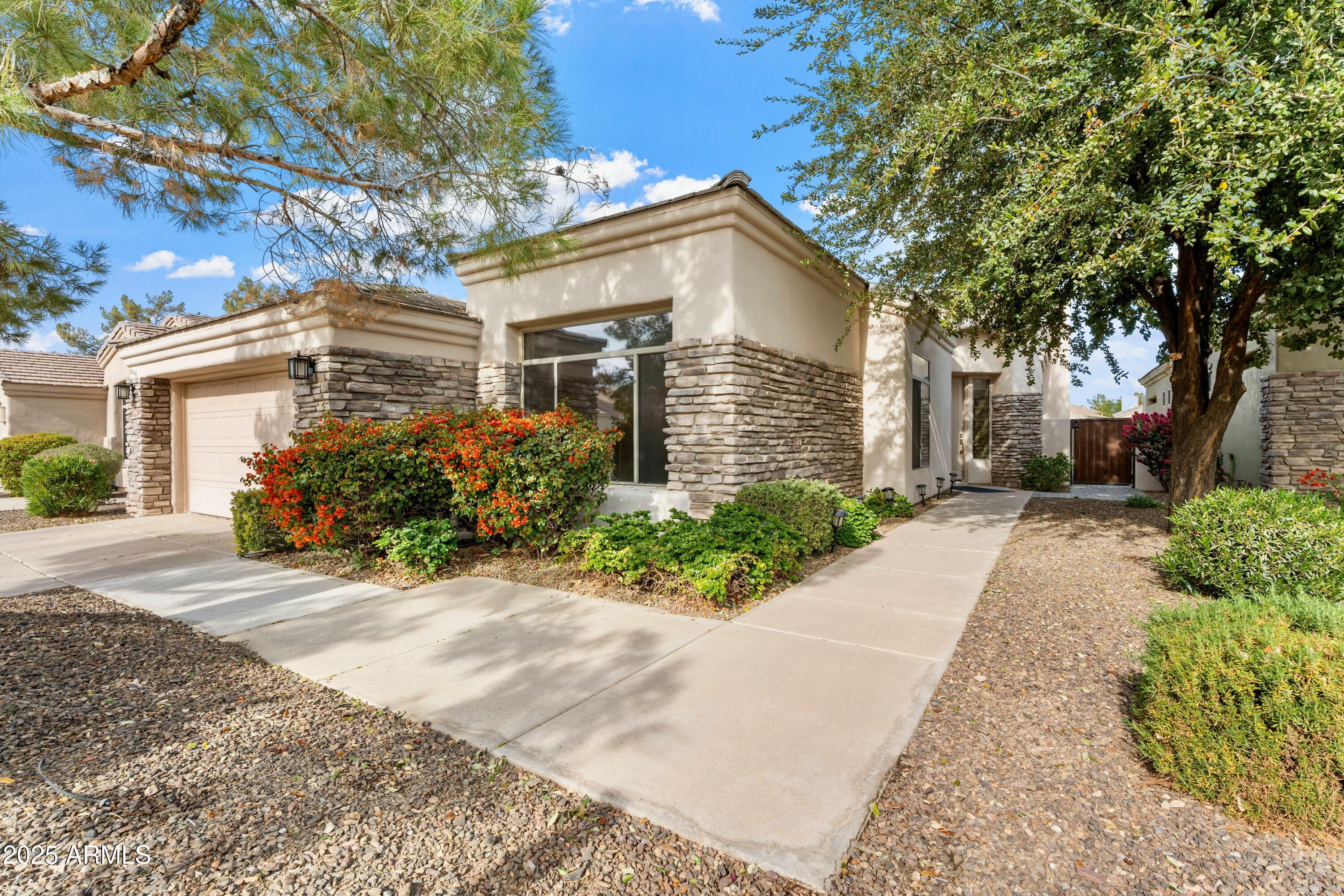 3830 East Carter Drive Phoenix, AZ 85042 - Photo 3 of 30 front view of a house with a street