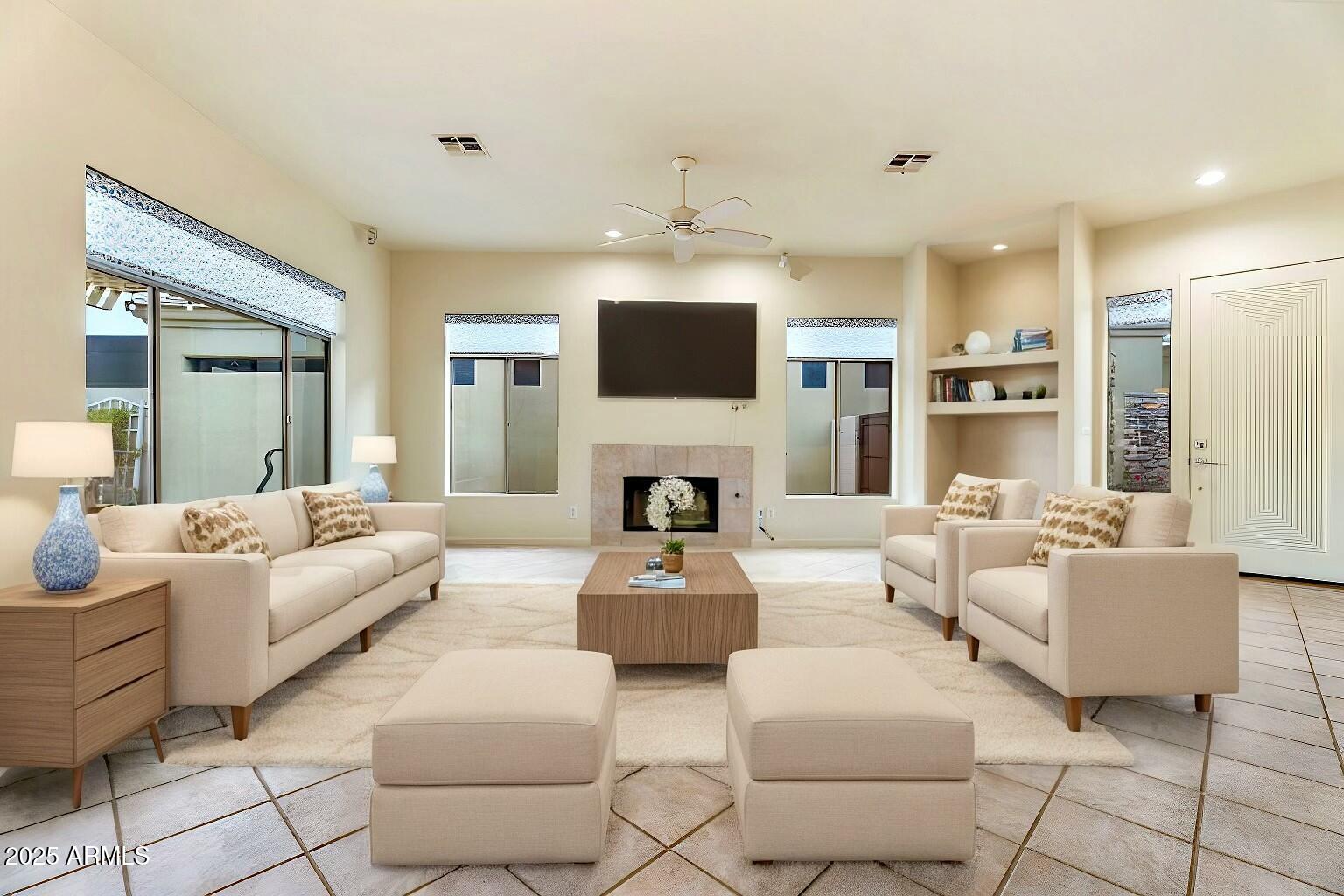 3830 East Carter Drive Phoenix, AZ 85042 - Photo 9 of 30 a living room with furniture fireplace and flat screen tv