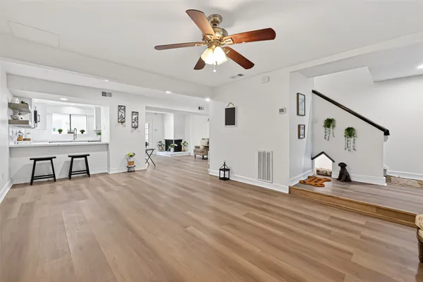 a living room with furniture and a table