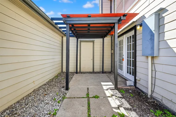 a view of a pathway with a door